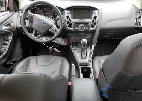 2016 Ford Focus Titanium z USA, uszkodzony, nr VIN 1FADP3N23GL261713